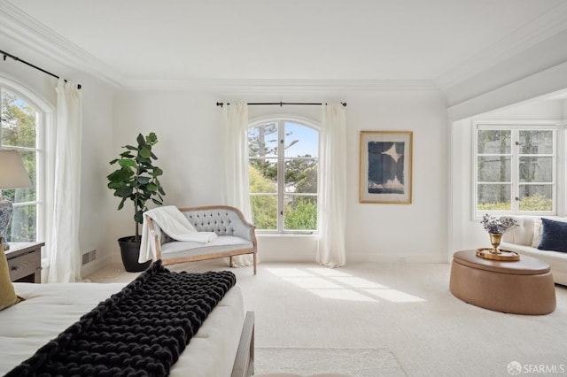 bedroom featuring carpet, visible vents, baseboards, and crown molding