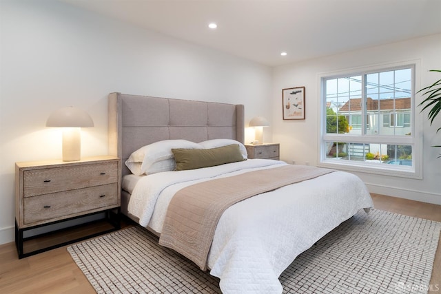 2277 33rd Ave, San Francisco, CA 94116 - bedroom with light wood-type flooring and recessed lighting