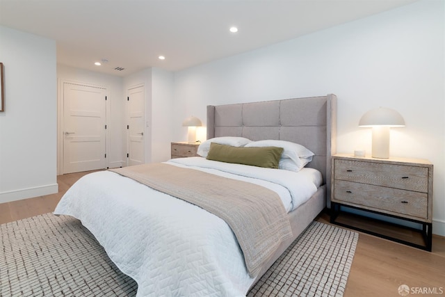 2277 33rd Ave, San Francisco, CA 94116 - bedroom featuring light wood-type flooring and recessed lighting