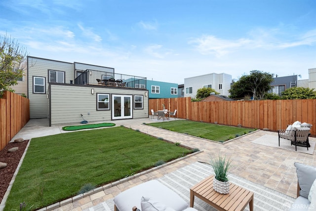 2277 33rd Ave, San Francisco, CA 94116 - back of house with french doors, a patio area, a fenced backyard, and a balcony