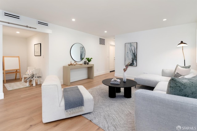 2277 33rd Ave, San Francisco, CA 94116 - living area featuring light wood-type flooring and recessed lighting