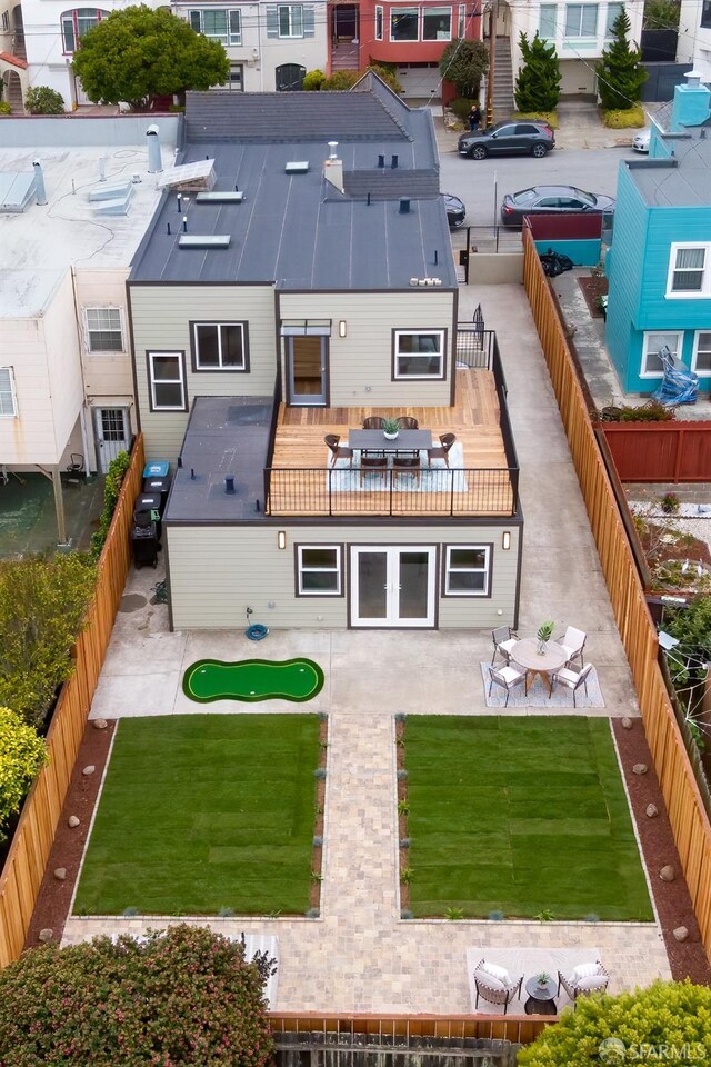 2277 33rd Ave, San Francisco, CA 94116 - back of house with a fenced backyard and a patio