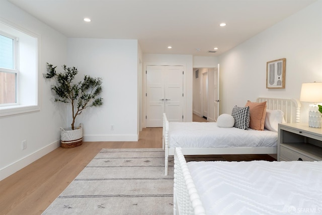 2277 33rd Ave, San Francisco, CA 94116 - bedroom featuring light wood finished floors and recessed lighting