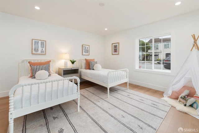 2277 33rd Ave, San Francisco, CA 94116 - bedroom featuring wood finished floors and recessed lighting