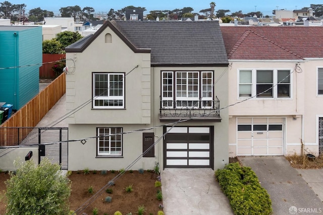 2277 33rd Ave, San Francisco, CA 94116 - view of front of property with concrete driveway, stucco siding, an attached garage, and roof with shingles