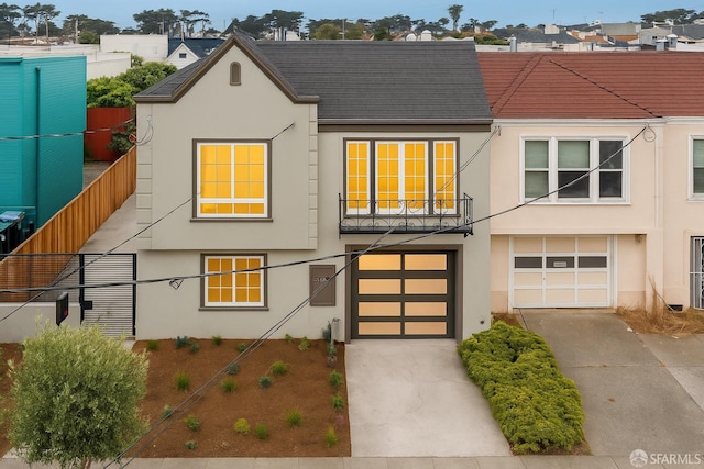 2277 33rd Ave, San Francisco, CA 94116 - view of front of house with stucco siding, concrete driveway, a garage, and roof with shingles