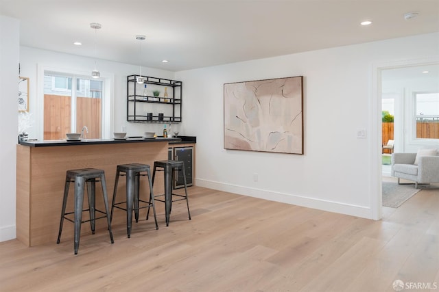 2277 33rd Ave, San Francisco, CA 94116 - indoor wet bar featuring light wood finished floors, recessed lighting, wine cooler, and pendant lighting