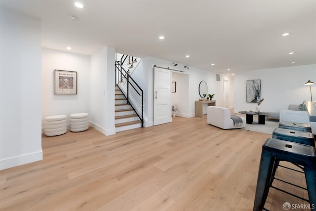 2277 33rd Ave, San Francisco, CA 94116 - living area with recessed lighting, light wood-type flooring, stairs, and a barn door
