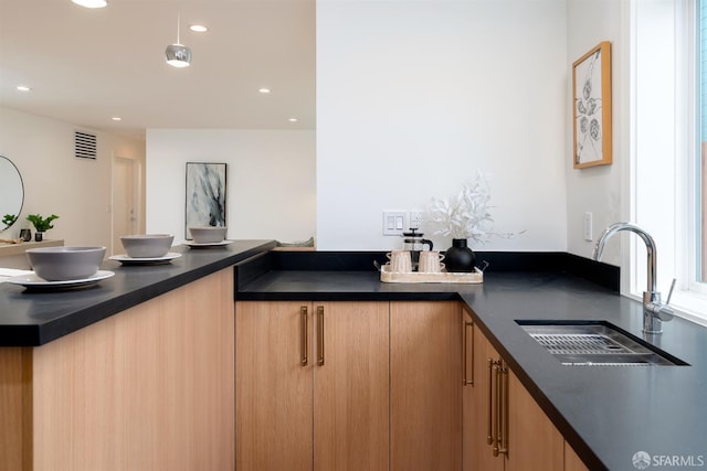 2277 33rd Ave, San Francisco, CA 94116 - kitchen featuring dark countertops and recessed lighting