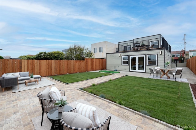 2277 33rd Ave, San Francisco, CA 94116 - back of house featuring french doors, outdoor lounge area, a fenced backyard, a patio area, and a balcony