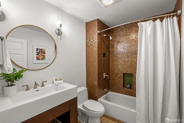 bathroom with toilet, shower / tub combo, and vanity