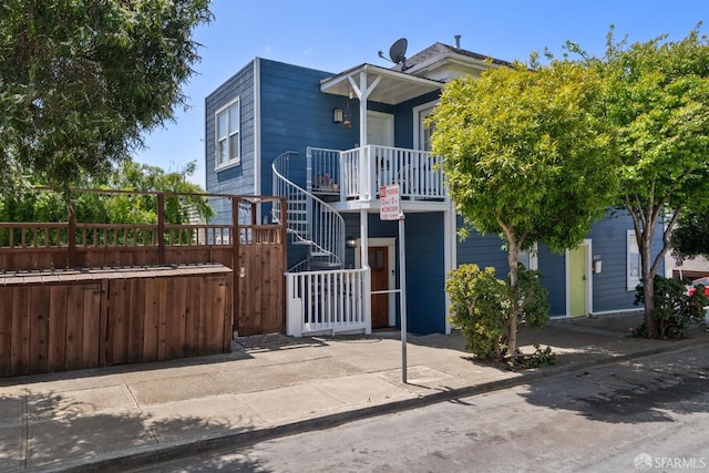 multi unit property with fence and stairs
