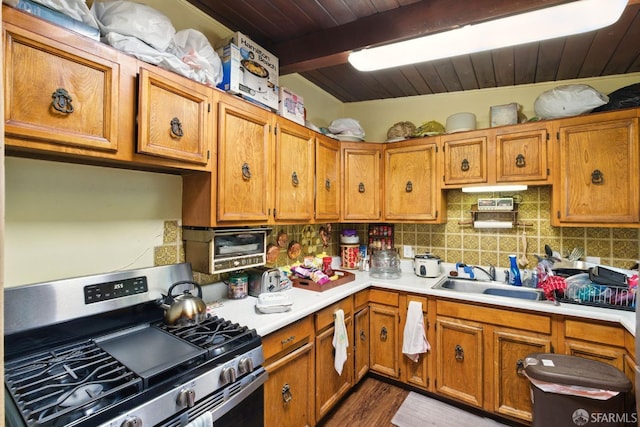 1146 Carlton Ave, Menlo Park, CA 94025 - kitchen with gas stove, a sink, wooden ceiling, light countertops, and backsplash