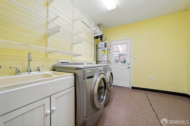 1835 Clayton Way, Concord, CA 94519 - laundry area featuring washer and clothes dryer, secured water heater, baseboards, and cabinet space