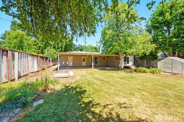 1835 Clayton Way, Concord, CA 94519 - back of house with an exterior structure, a patio area, and an outdoor structure