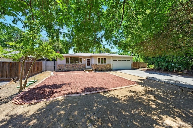 1835 Clayton Way, Concord, CA 94519 - single story home with stone siding, concrete driveway, and a garage