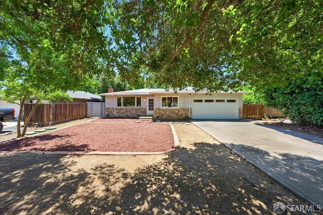 1835 Clayton Way, Concord, CA 94519 - single story home with driveway, stone siding, a garage, and a chimney
