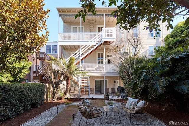 view of patio / terrace with a balcony