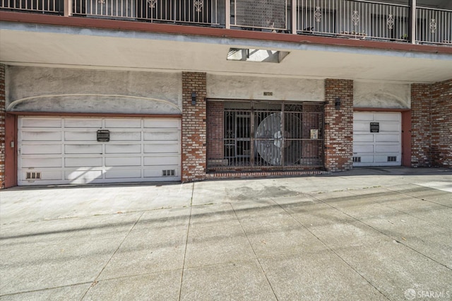 view of exterior entry with a garage