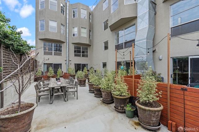 view of patio with outdoor dining area