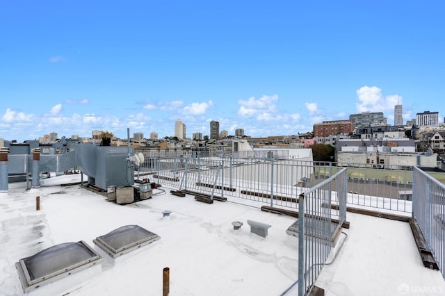 view of patio / terrace with a skyline view and a balcony