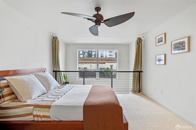 bedroom with carpet and a ceiling fan