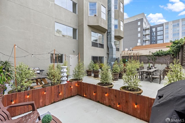 view of patio / terrace featuring grilling area and outdoor dining space