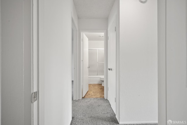 1919 Ygnacio Valley Rd Unit 33, Walnut Creek, CA 94598 - corridor featuring carpet and a textured ceiling