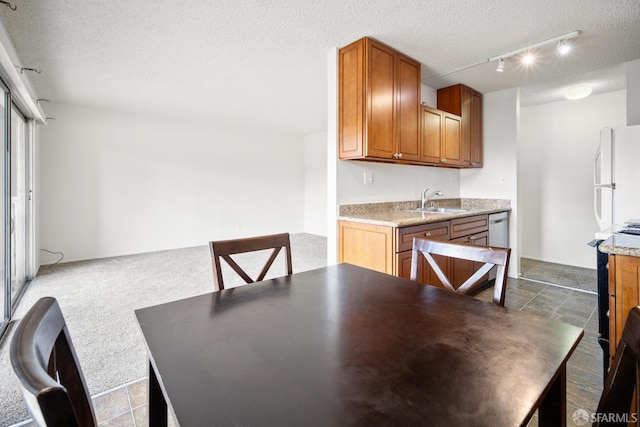 1919 Ygnacio Valley Rd Unit 33, Walnut Creek, CA 94598 - dining space featuring a textured ceiling and track lighting