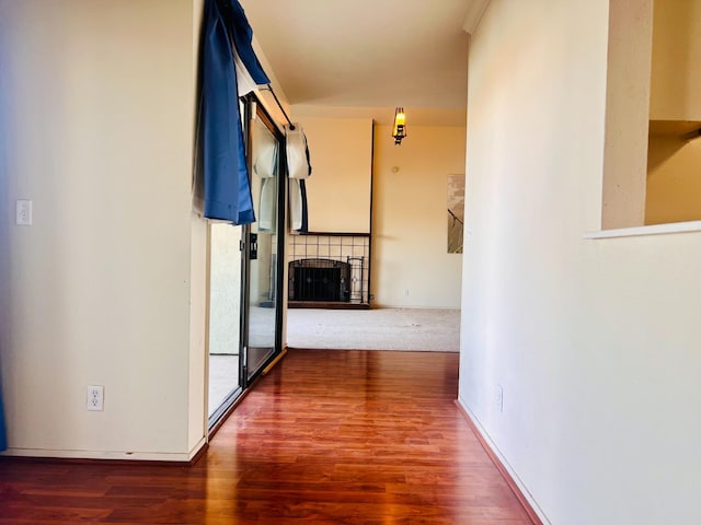 hallway featuring dark wood-type flooring