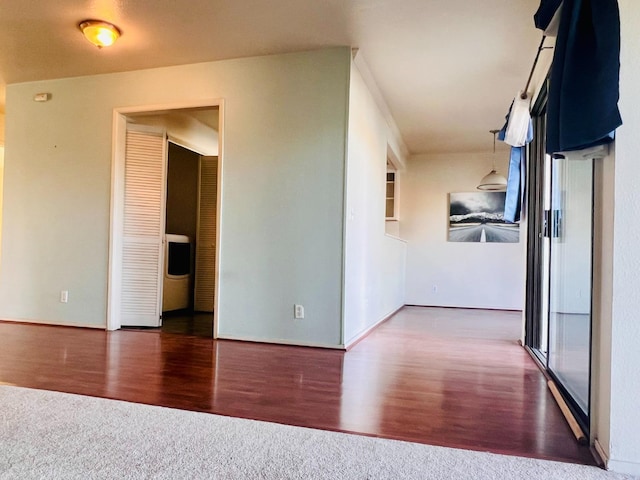 unfurnished room featuring dark hardwood / wood-style floors