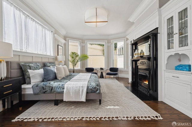 1370 Green St, San Francisco, CA 94109 - bedroom featuring a fireplace with flush hearth, ornamental molding, and dark wood-style floors