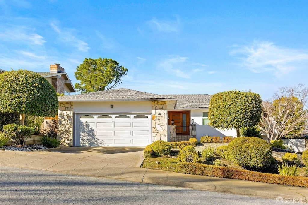 view of front of property featuring a garage