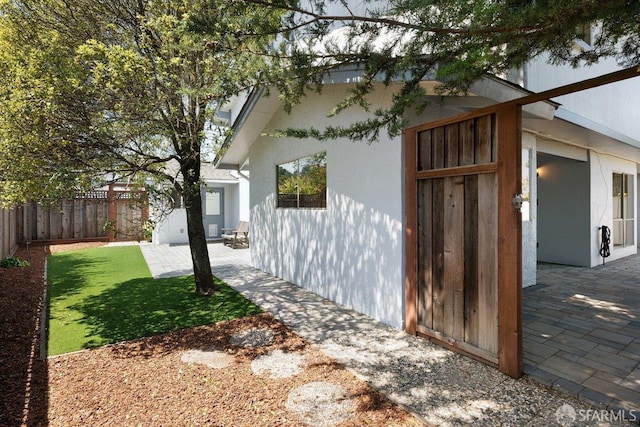 2691 Sean Ct, South San Francisco, CA 94080 - view of side of home with stucco siding and a patio area