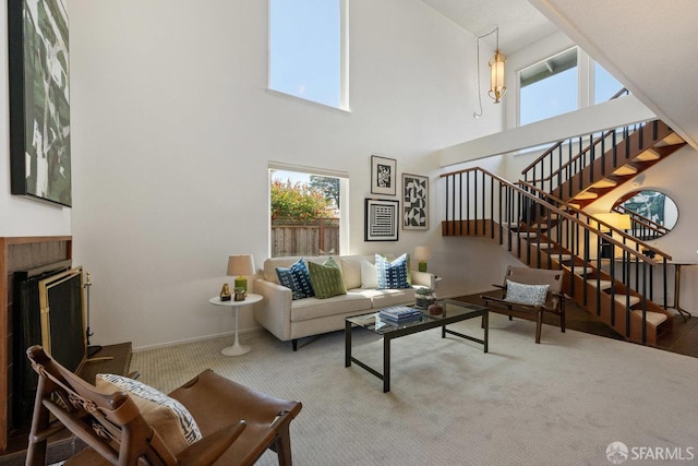 2691 Sean Ct, South San Francisco, CA 94080 - living room with a towering ceiling, stairs, carpet flooring, and baseboards