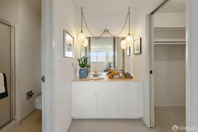 2691 Sean Ct, South San Francisco, CA 94080 - bathroom with a spacious closet, vanity, a stall shower, and toilet