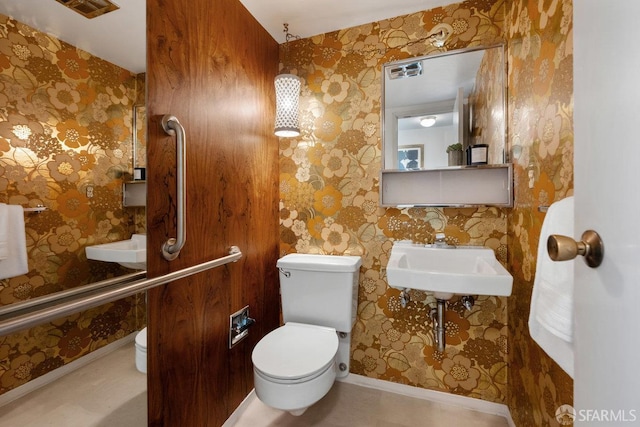 2691 Sean Ct, South San Francisco, CA 94080 - half bath featuring wallpapered walls, toilet, and baseboards
