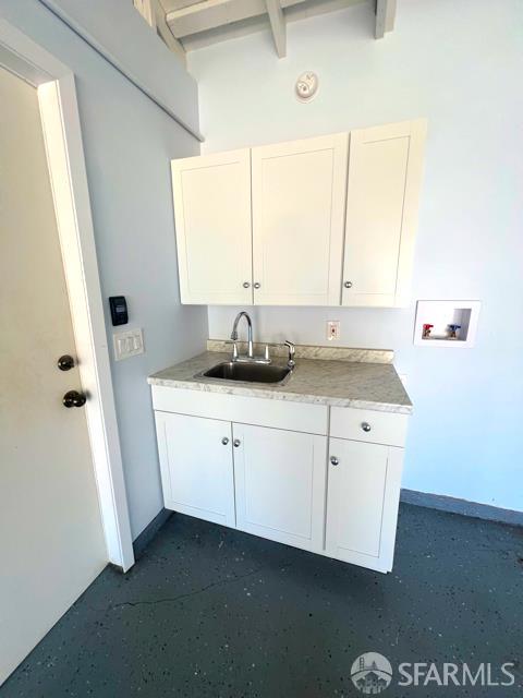 2691 Sean Ct, South San Francisco, CA 94080 - washroom with cabinet space, baseboards, and hookup for a washing machine