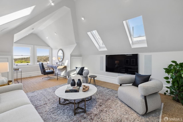 living room featuring carpet and lofted ceiling with skylight