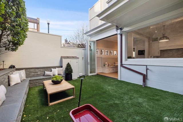 view of yard with outdoor lounge area