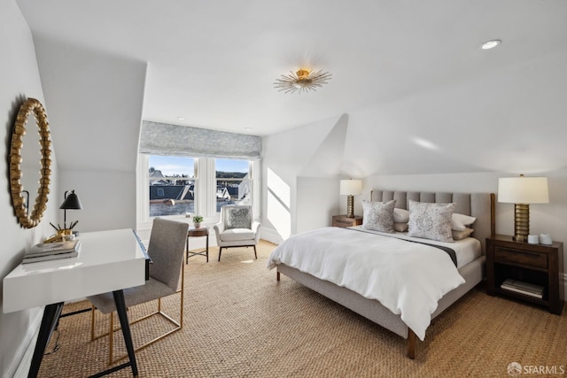 bedroom with vaulted ceiling