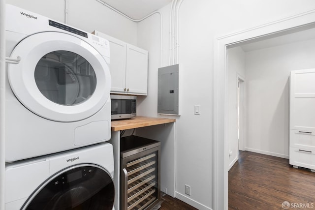 washroom featuring cabinets, stacked washing maching and dryer, wine cooler, dark hardwood / wood-style floors, and electric panel