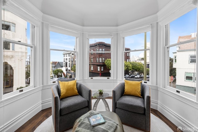 sunroom / solarium featuring a healthy amount of sunlight