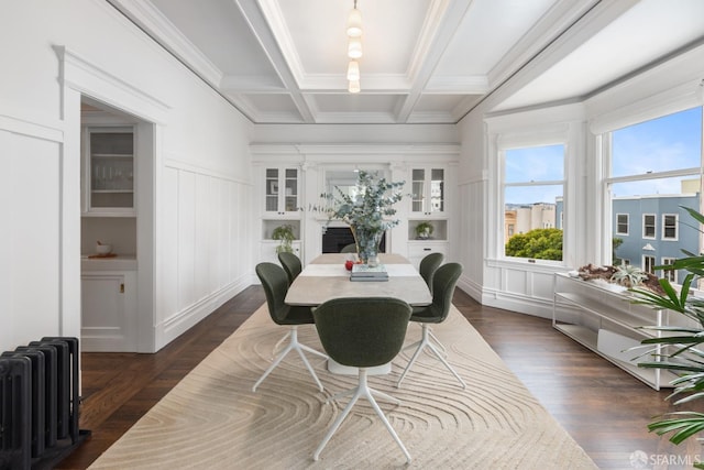 sunroom with radiator, beamed ceiling, and coffered ceiling