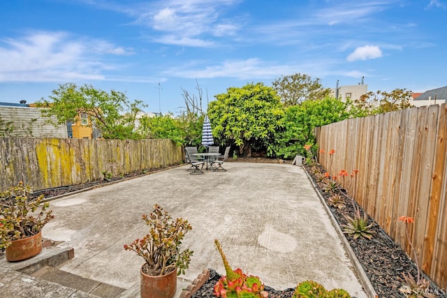 2375 31st Ave, San Francisco, CA 94116 - view of patio featuring a fenced backyard and outdoor dining area