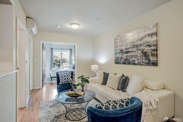 2375 31st Ave, San Francisco, CA 94116 - living room featuring light wood-style floors, baseboards, and a wall unit AC