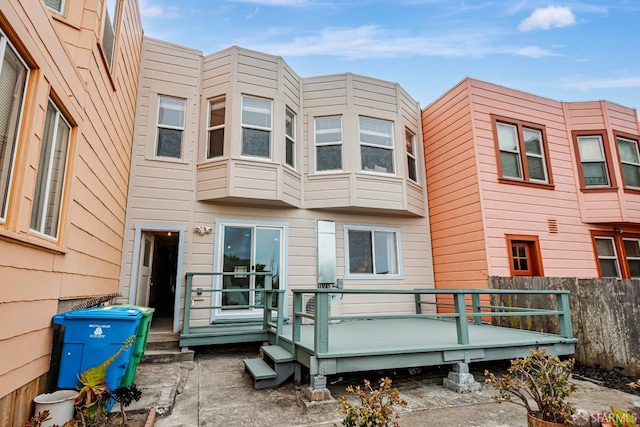 2375 31st Ave, San Francisco, CA 94116 - rear view of property with fence and a deck