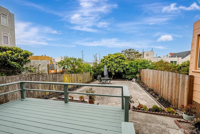 2375 31st Ave, San Francisco, CA 94116 - wooden deck with a patio and a fenced backyard
