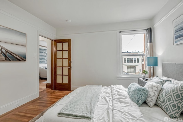 2375 31st Ave, San Francisco, CA 94116 - bedroom featuring baseboards and wood finished floors