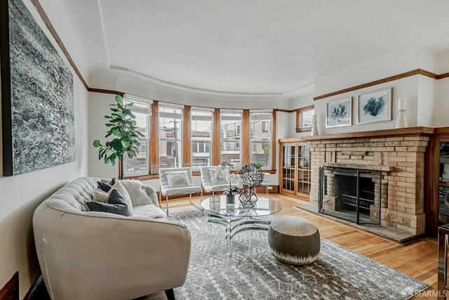 2375 31st Ave, San Francisco, CA 94116 - living room with a brick fireplace, wood finished floors, and a wealth of natural light